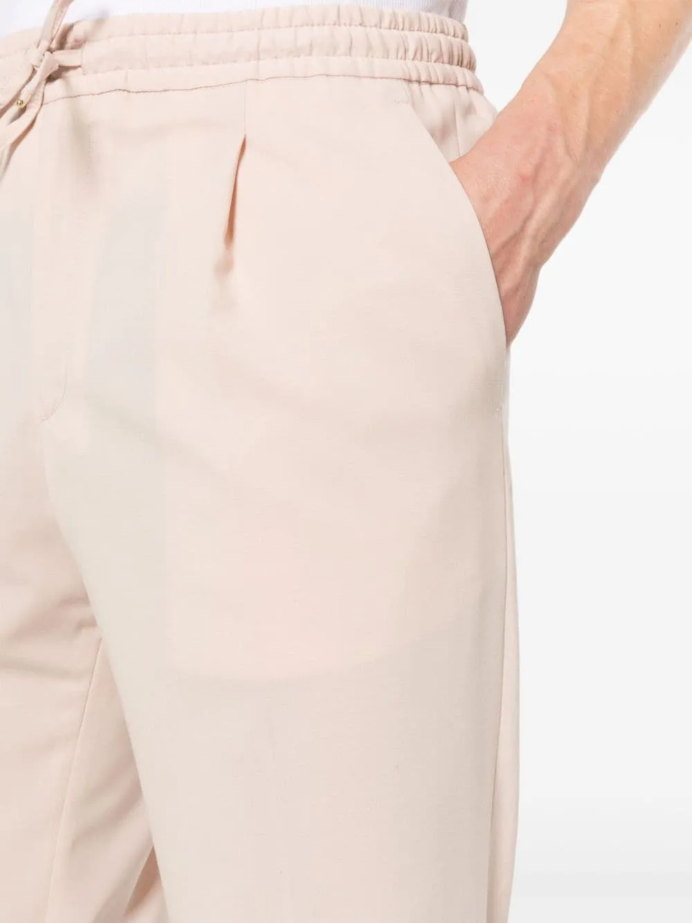 Pantaloni affusolati in rosa - uomo